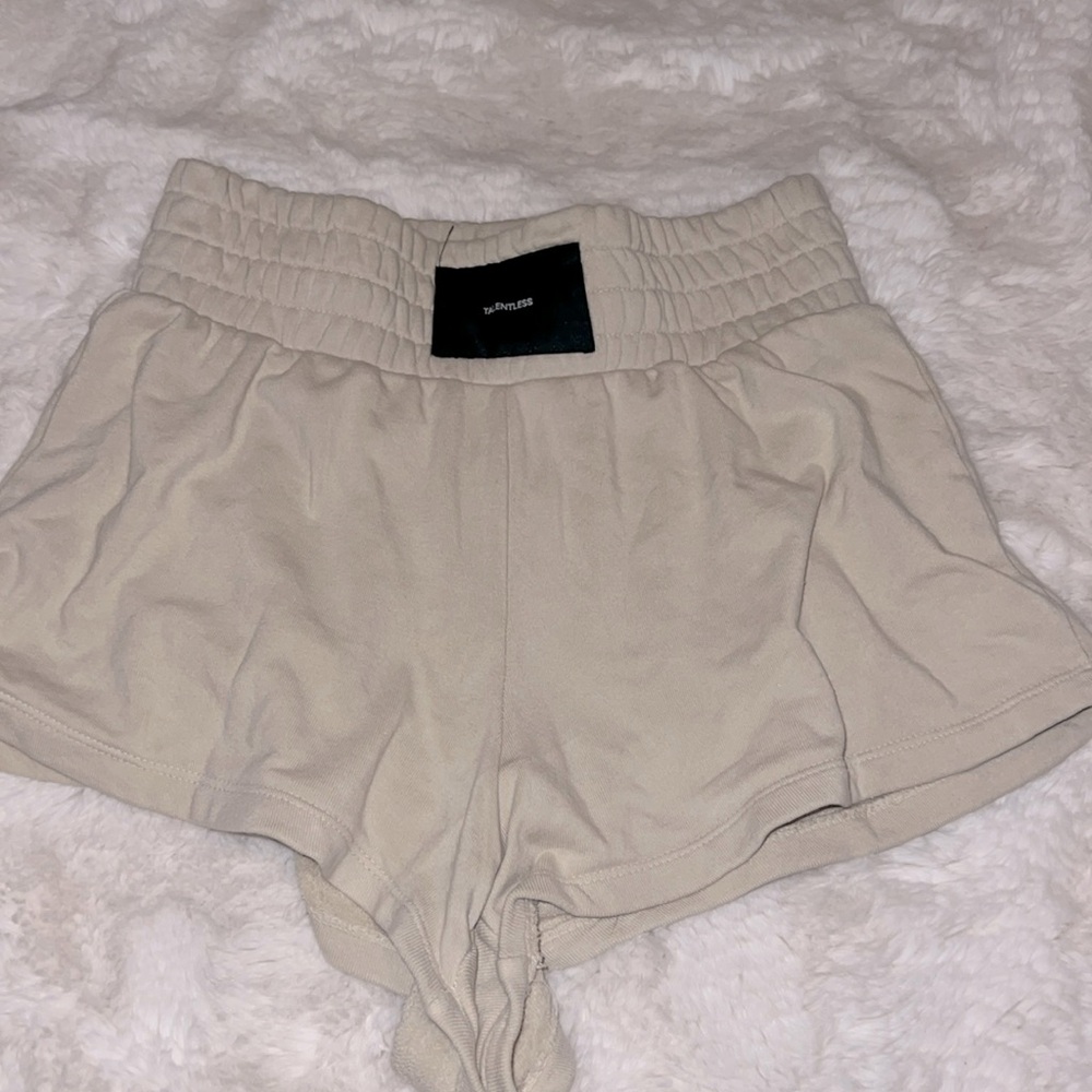 Size small cream colored talentless shorts
